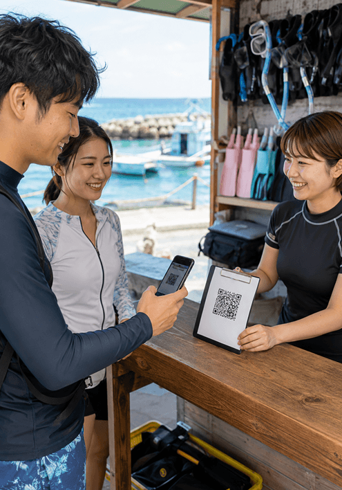 店頭や集合場所でQRコードから参加同意書を案内するダイビングショップ
